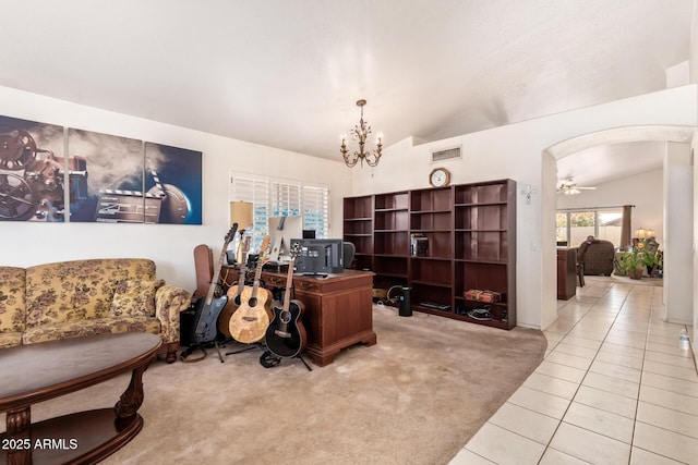 4441 E Desert Wind Dr, Phoenix, AZ 85044 - carpeted office with tile patterned floors, vaulted ceiling, arched walkways, a chandelier, and a ceiling fan