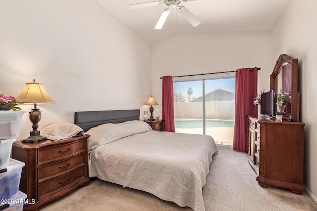 4441 E Desert Wind Dr, Phoenix, AZ 85044 - bedroom featuring access to exterior, light carpet, lofted ceiling, and a ceiling fan