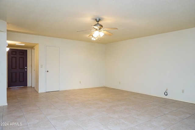 empty room featuring ceiling fan