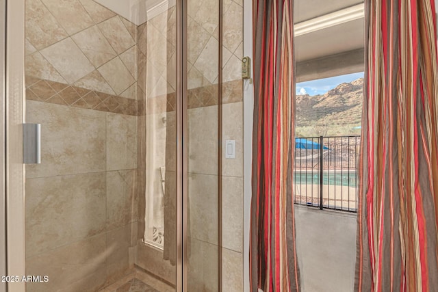 bathroom with a mountain view