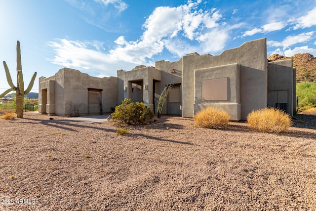 view of adobe home