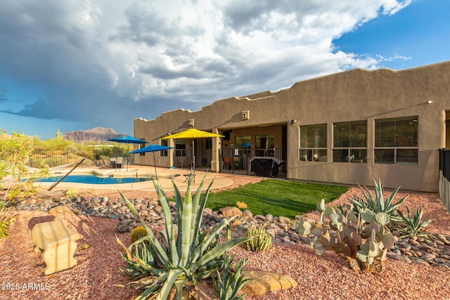 rear view of house with a patio area