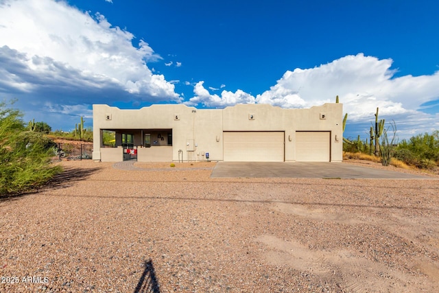 adobe home with a garage