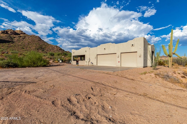 exterior space featuring a mountain view