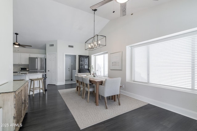 4313 E Briarwood Ter, Phoenix, AZ 85048 - dining room with ceiling fan, baseboards, dark wood finished floors, high vaulted ceiling, and a chandelier