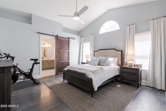 4313 E Briarwood Ter, Phoenix, AZ 85048 - bedroom featuring a barn door, vaulted ceiling, dark wood-style floors, a ceiling fan, and ensuite bathroom