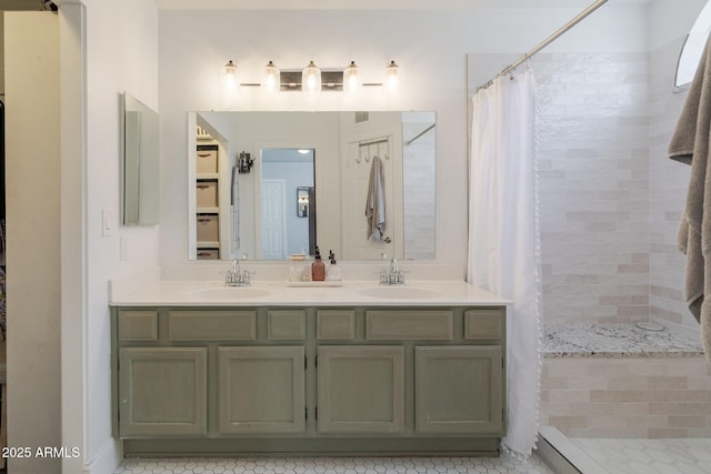 4313 E Briarwood Ter, Phoenix, AZ 85048 - bathroom with tiled shower and double vanity