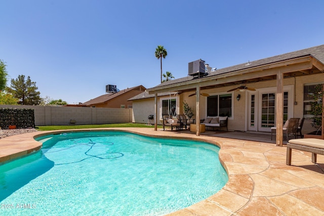4313 E Briarwood Ter, Phoenix, AZ 85048 - view of swimming pool with a fenced backyard, a ceiling fan, a patio, an outdoor hangout area, and central AC unit