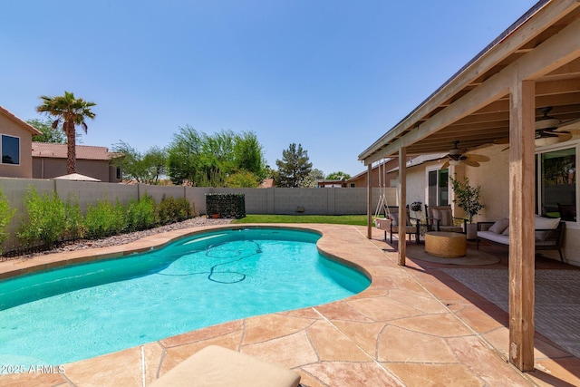 4313 E Briarwood Ter, Phoenix, AZ 85048 - view of swimming pool with a patio, a ceiling fan, a fenced backyard, and outdoor lounge area