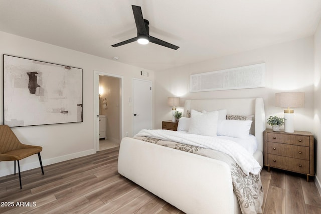 bedroom featuring light wood-style floors, baseboards, and a ceiling fan