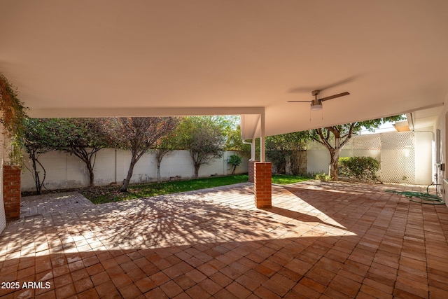 view of patio / terrace with a ceiling fan and a fenced backyard