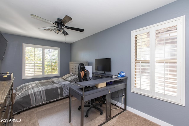 bedroom with ceiling fan and carpet flooring