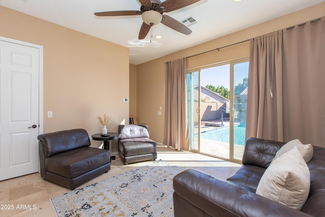 living room featuring ceiling fan