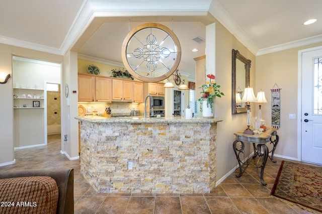 kitchen featuring crown molding, stainless steel microwave, visible vents, light brown cabinetry, and light stone countertops