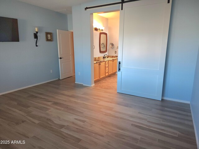 bedroom featuring light hardwood / wood-style floors and ceiling fan