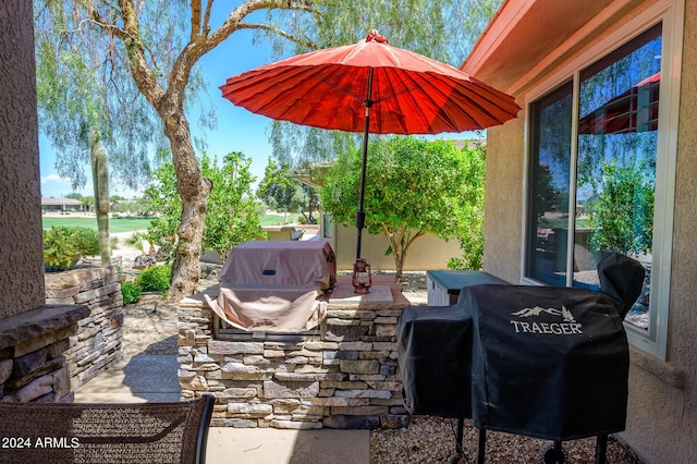 view of patio featuring a grill and area for grilling