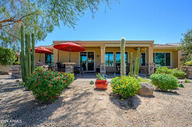 rear view of property with a patio area