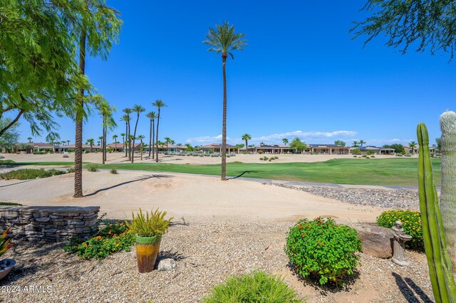 back of property with a patio