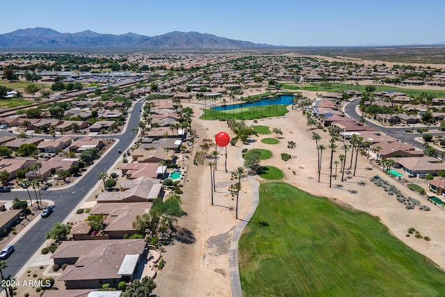 aerial view featuring a residential view and a water and mountain view