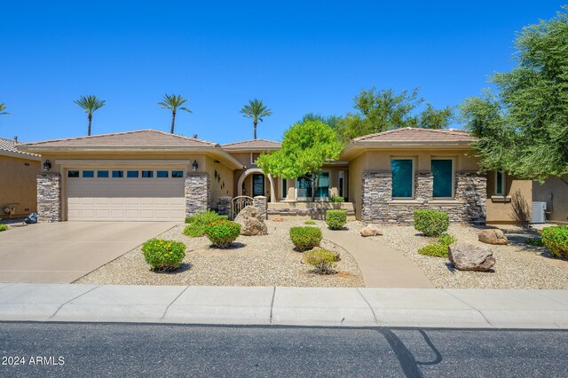 prairie-style home with a garage