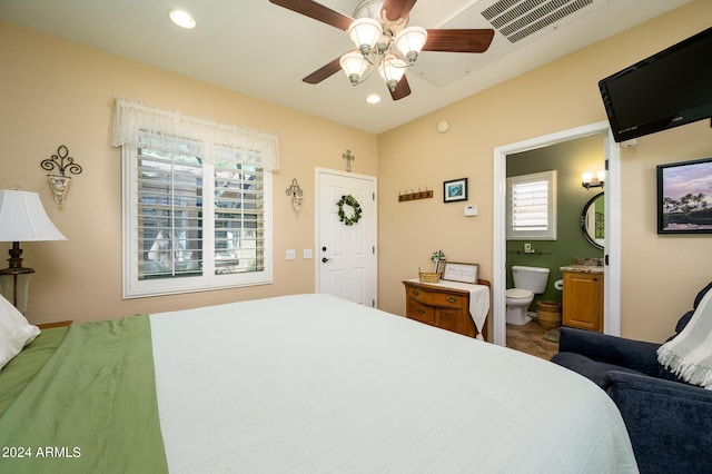 bedroom with ensuite bathroom, a ceiling fan, visible vents, and recessed lighting