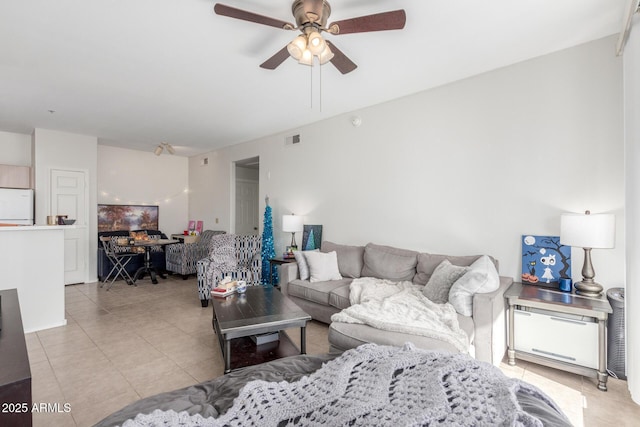 living room with ceiling fan