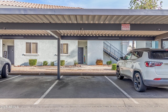 view of parking featuring a carport