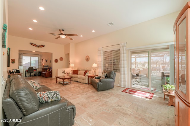 living room featuring ceiling fan