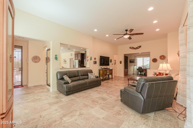 living room with ceiling fan