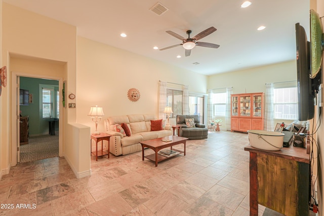 living room featuring ceiling fan