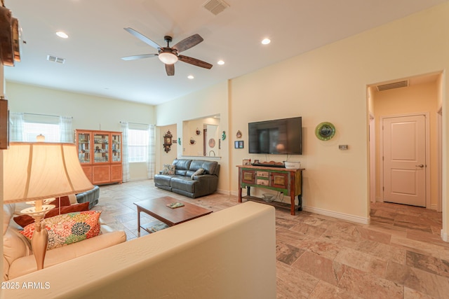 living room featuring ceiling fan