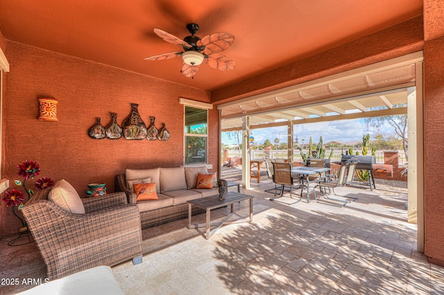 view of patio / terrace featuring outdoor lounge area and ceiling fan