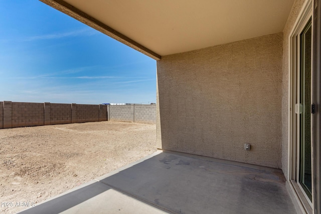 exterior space featuring a patio area and a fenced backyard