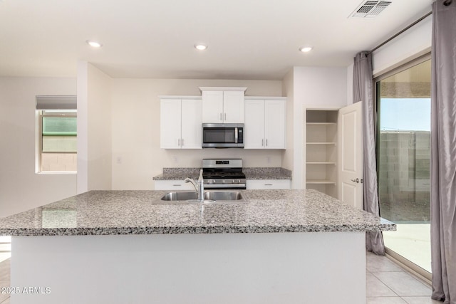 kitchen featuring a sink, visible vents, appliances with stainless steel finishes, and a healthy amount of sunlight