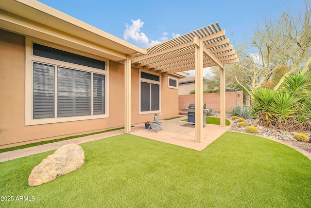 exterior space with fence, grilling area, and a pergola