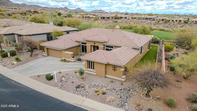 bird's eye view featuring a residential view and a mountain view