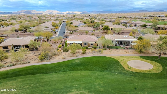 drone / aerial view with a residential view and a mountain view