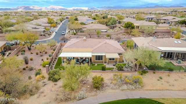 birds eye view of property with a residential view and a mountain view