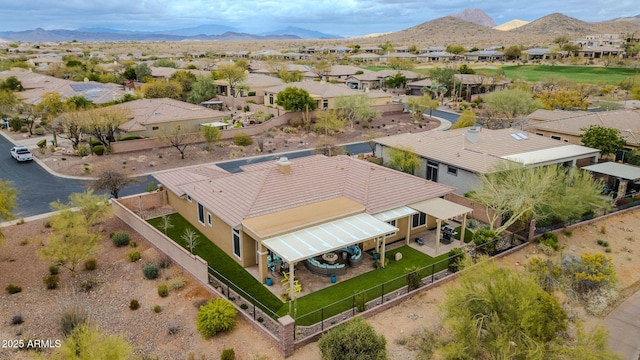 bird's eye view featuring a residential view and a mountain view