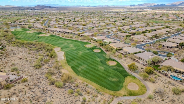 bird's eye view with a residential view, a mountain view, and golf course view