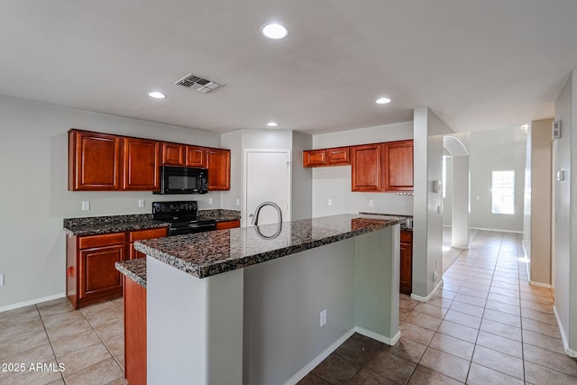 kitchen featuring black appliances, light tile patterned floors, recessed lighting, and visible vents