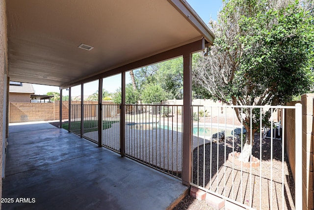 view of patio featuring a fenced in pool, a fenced backyard, and visible vents