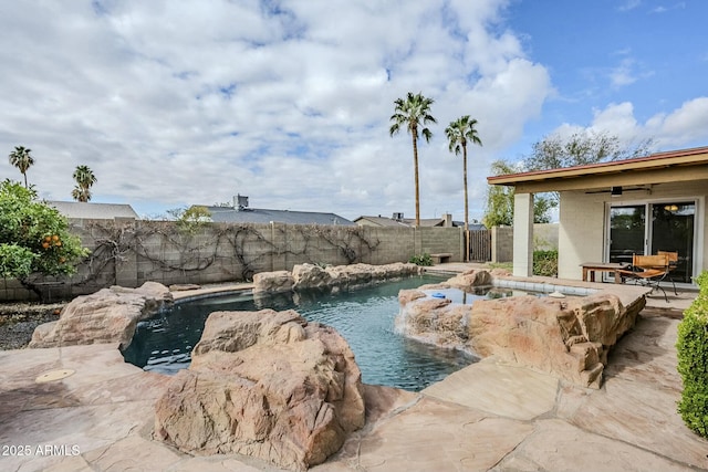 view of swimming pool with a fenced in pool, a fenced backyard, and a patio area