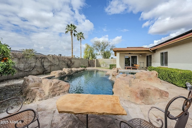 view of pool featuring a fenced in pool, a patio, and a fenced backyard