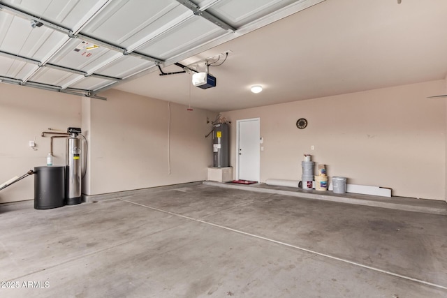 garage with water heater and a garage door opener