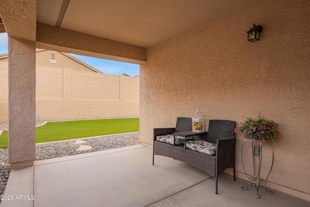 view of patio featuring a fenced backyard