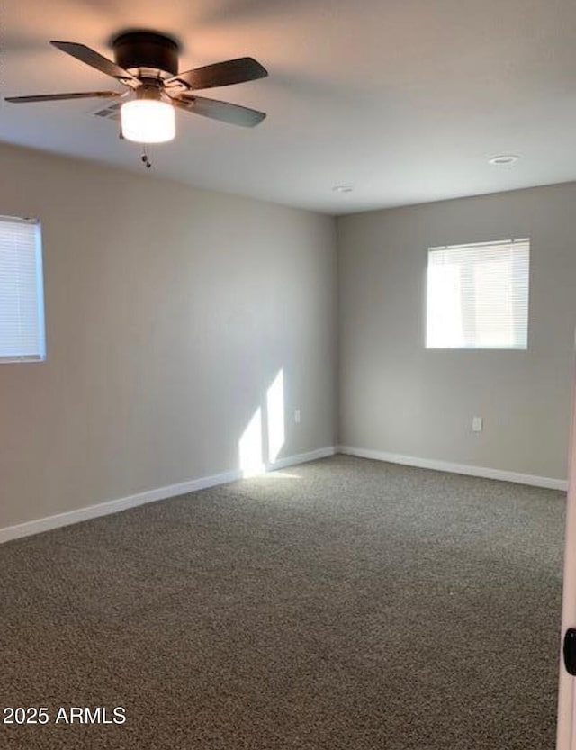 unfurnished room featuring carpet floors and ceiling fan