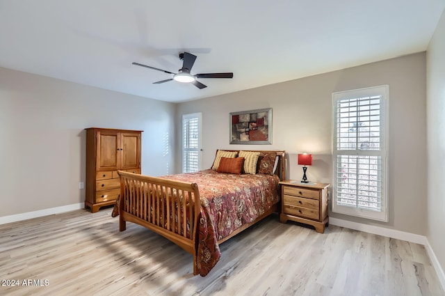 bedroom featuring ceiling fan and light hardwood / wood-style floors