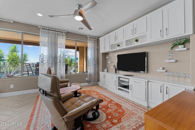 living room featuring ceiling fan