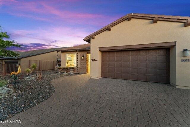 view of front of home with a garage